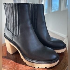 Dolce Vita lug sole boots in black. Size 6.5